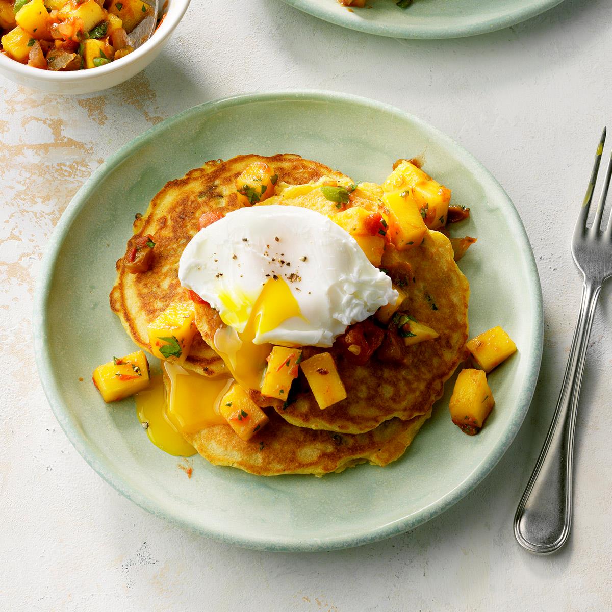 Corn Cakes With Poached Eggs And Mango Salsa Recipe How To Make It Taste Of Home