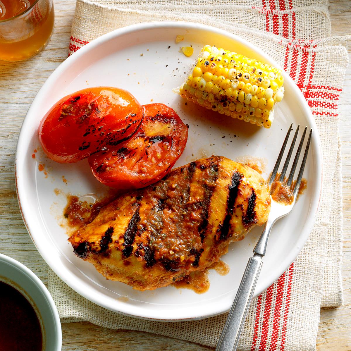 image of Grilled Basil Chicken and Tomatoes recipe by Taste of Home