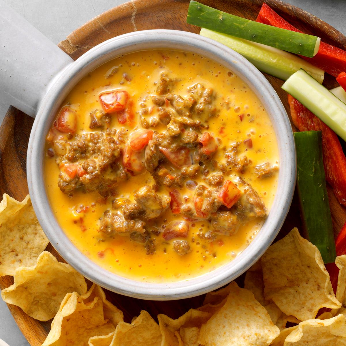 How long to heat up nacho cheese in crock pot Slow Cooker Cheese Dip Recipe How To Make It Taste Of Home