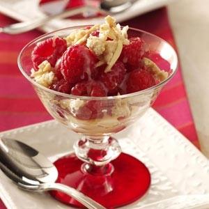 Raspberries with White Chocolate Sauce and Sugared Almonds image