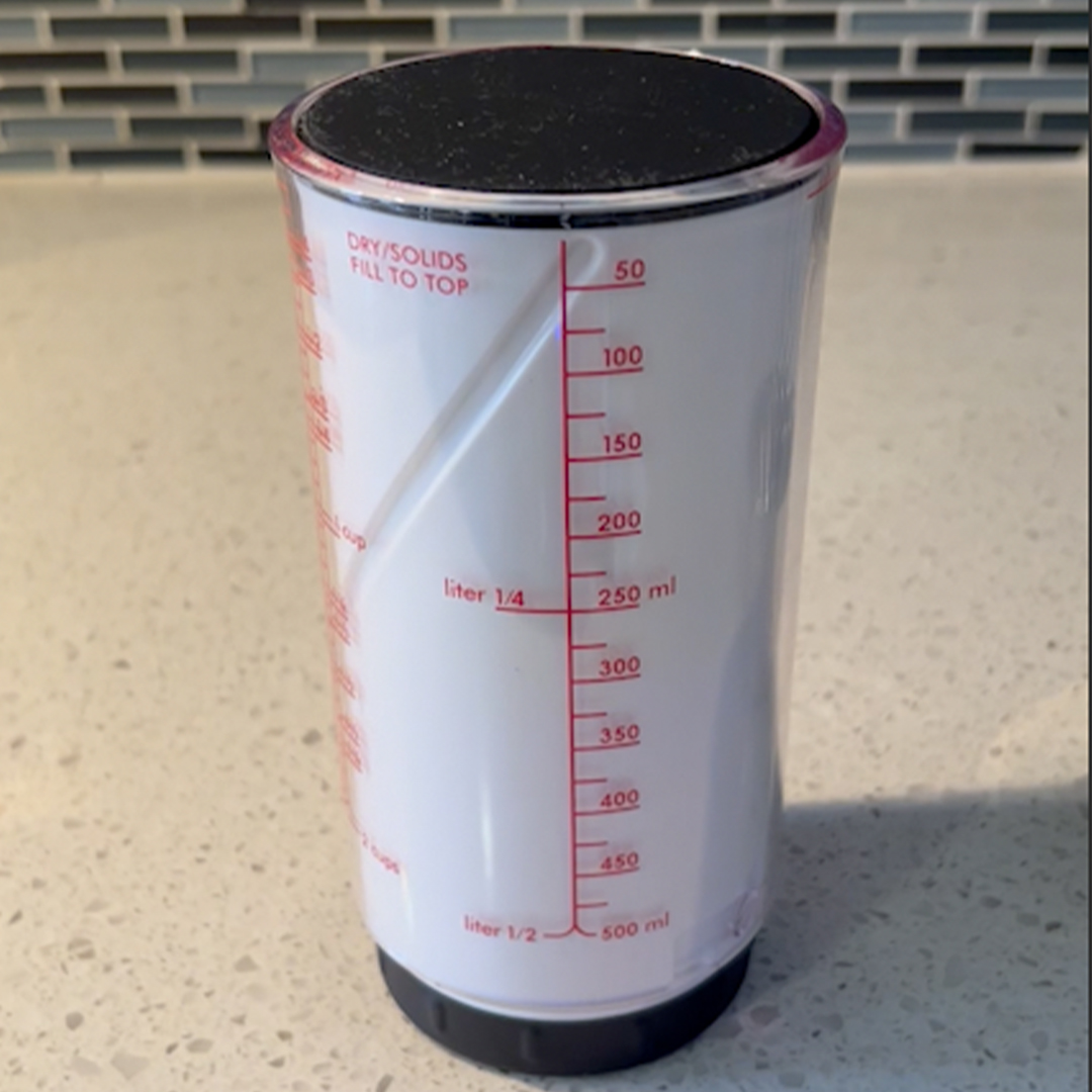 Essentials for Bakers: Adjustable Plunger-Style Measuring Cup